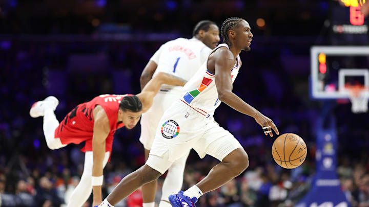 Mar 3, 2025; Philadelphia, Pennsylvania, USA; Philadelphia 76ers guard Tyrese Maxey (0) dribbles past Portland Trail Blazers forward Toumani Camara (33) during the first quarter at Wells Fargo Center. Mandatory Credit: Bill Streicher-Imagn Images Mar 3, 2025; Philadelphia, Pennsylvania, USA; Philadelphia 76ers guard Tyrese Maxey (0) dribbles past Portland Trail Blazers forward Toumani Camara (33) during the first quarter at Wells Fargo Center. Mandatory Credit: Bill Streicher-Imagn Images
