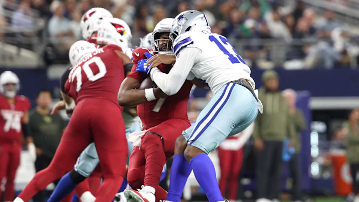 Nov 3, 2025; Arlington, Texas, USA; Dallas Cowboys defensive end Dante Fowler Jr. (13) sacks Arizona Cardinals quarterback Jacoby Brissett (7) in the second half at AT&T Stadium. Mandatory Credit: Kevin Jairaj-Imagn Images