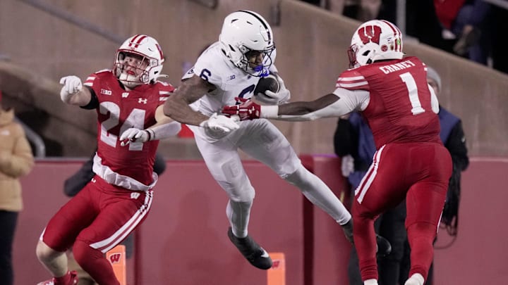 *Penn State wide receiver Harrison Wallace III (6) make s a reception between Wisconsin safety Hunter Wohler (24) and linebacker Jake Chaney (1) during the fourth quarter of their game Saturday, October 26, 2024 at Camp Randall Stadium in Madison, Wisconsin. Penn State beat Wisconsin 28-13.