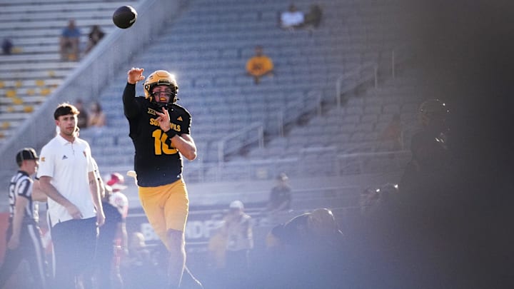 ASU Sun Devils quarterback Sam Leavitt (10) warms up before the game against the Houston Cougars at Mountain America Stadium in Tempe on Oct. 25, 2025. ASU Sun Devils quarterback Sam Leavitt (10) warms up before the game against the Houston Cougars at Mountain America Stadium in Tempe on Oct. 25, 2025.