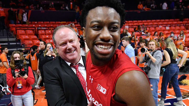 Feb 10, 2026; Champaign, Illinois, USA; Wisconsin Badgers head coach Greg Gard gives a hand to player Wisconsin Badgers guard John Blackwell (25) after a win over the Illinois Fighting Illini during the second half at State Farm Center. Mandatory Credit: Ron Johnson-Imagn Images Feb 10, 2026; Champaign, Illinois, USA; Wisconsin Badgers head coach Greg Gard gives a hand to player Wisconsin Badgers guard John Blackwell (25) after a win over the Illinois Fighting Illini during the second half at State Farm Center. Mandatory Credit: Ron Johnson-Imagn Images