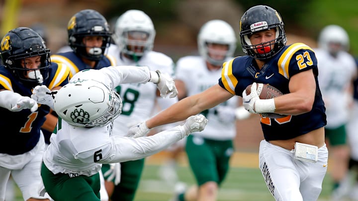 Central Oklahoma's Oscar Hammond stiff arms Northwest Missouri's Cahleel Smith during the the college football game between the University of Central Oklahoma Bronchos and the Northwest Missouri State Bearcats at the Chad Richison Stadium in Edmond, Okla., Saturday, Sept., 24, 2022. UCO beat Northwest Missouri 23 to 14.

Uco Vs Nwmsu Fb