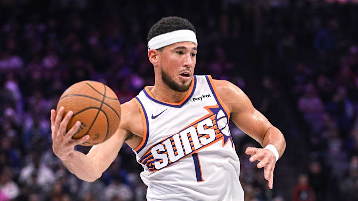 Nov 26, 2025; Sacramento, California, USA; Phoenix Suns guard Devin Booker (1) controls the ball against the Sacramento Kings during the second quarter at Golden 1 Center. Mandatory Credit: Ed Szczepanski-Imagn Images