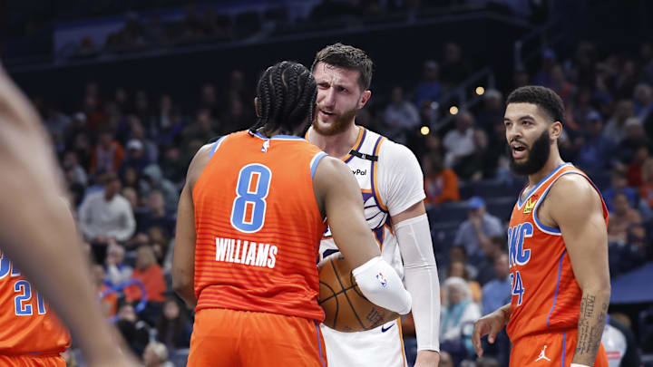 Nov 15, 2024; Oklahoma City, Oklahoma, USA; Phoenix Suns center Jusuf Nurkic (20) and Oklahoma City Thunder forward Jalen Williams (8) get into an argument after a play during the second quarter at Paycom Center. Mandatory Credit: Alonzo Adams-Imagn Images Nov 15, 2024; Oklahoma City, Oklahoma, USA; Phoenix Suns center Jusuf Nurkic (20) and Oklahoma City Thunder forward Jalen Williams (8) get into an argument after a play during the second quarter at Paycom Center. Mandatory Credit: Alonzo Adams-Imagn Images