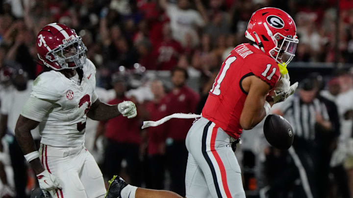 Georgia Bulldogs wide receiver Talyn Taylor (11) drops a pass from Georgia Bulldogs quarterback Gunner Stockton (14) during the second half of a NCAA college football game against Alabama in Athens, Ga., on Saturday, September 27, 2025. Georgia Bulldogs wide receiver Talyn Taylor (11) drops a pass from Georgia Bulldogs quarterback Gunner Stockton (14) during the second half of a NCAA college football game against Alabama in Athens, Ga., on Saturday, September 27, 2025.
