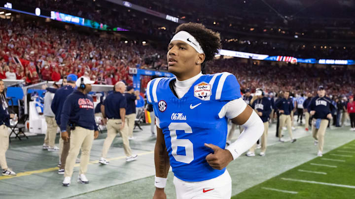 Jan 8, 2026; Glendale, AZ, USA; Mississippi Rebels quarterback Trinidad Chambliss (6) against the Miami Hurricanes during the 2026 Fiesta Bowl and semifinal game of the College Football Playoff at State Farm Stadium. Mandatory Credit: Mark J. Rebilas-Imagn Images