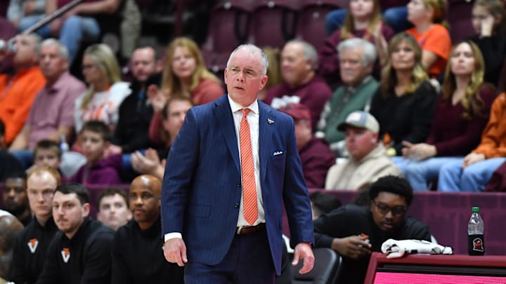Jan 7, 2026; Blacksburg, Virginia, USA;  Virginia Tech Hokies head coach Mike Young watches his team during the first half at Cassell Coliseum. Mandatory Credit: Brian Bishop-Imagn Images