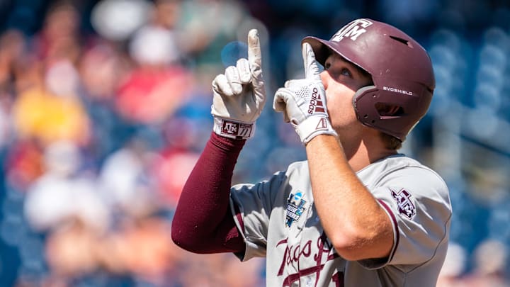 Jun 22, 2022; Omaha, NE, USA; Texas A&M Aggies designated hitter Austin Bost (11) reacts after