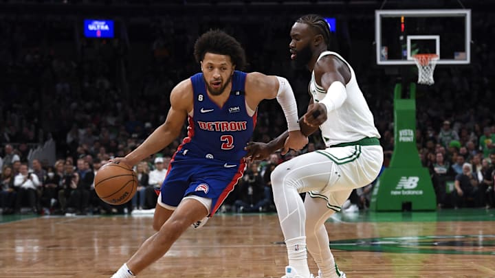 Nov 9, 2022; Boston, Massachusetts, USA; Detroit Pistons guard Cade Cunningham (2) controls the ball while Boston Celtics guard Jaylen Brown (7) defends during the first half at TD Garden. Mandatory Credit: Bob DeChiara-Imagn Images