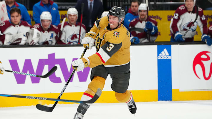 Apr 14, 2024; Las Vegas, Nevada, USA; Vegas Golden Knights defenseman Brayden McNabb (3) shoots against the Colorado Avalanche during the first period at T-Mobile Arena. Mandatory Credit: Stephen R. Sylvanie-Imagn Images