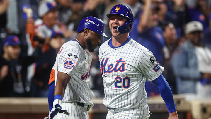 Oct 18, 2024; New York City, New York, USA; New York Mets first baseman Pete Alonso (20) reacts scoring a run during the fourth inning against the Los Angeles Dodgers during game five of the NLCS for the 2024 MLB playoffs at Citi Field. Mandatory Credit: Vincent Carchietta-Imagn Images