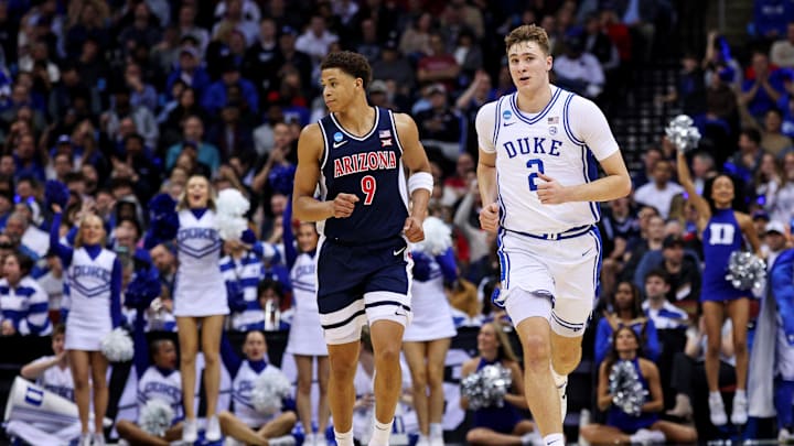 Mar 27, 2025; Newark, NJ, USA; Duke Blue Devils forward Cooper Flagg (2) reacts after a play against Arizona Wildcats forward Carter Bryant (9) during the second half during an East Regional semifinal of the 2025 NCAA tournament at Prudential Center. Mandatory Credit: Vincent Carchietta-Imagn Images