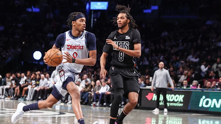Feb 5, 2025; Brooklyn, New York, USA; Washington Wizards guard Bilal Coulibaly (0) looks to drive past Brooklyn Nets forward Ziaire Williams (8) in the first quarter at Barclays Center. Mandatory Credit: Wendell Cruz-Imagn Images Feb 5, 2025; Brooklyn, New York, USA; Washington Wizards guard Bilal Coulibaly (0) looks to drive past Brooklyn Nets forward Ziaire Williams (8) in the first quarter at Barclays Center. Mandatory Credit: Wendell Cruz-Imagn Images