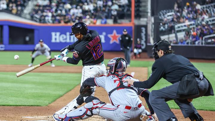 New York Mets shortstop Francisco Lindor (12) hits a three-run home run in the third inning against the Minnesota Twins.