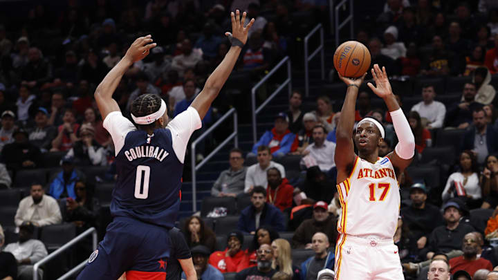 Nov 25, 2025; Washington, District of Columbia, USA; Atlanta Hawks forward Onyeka Okongwu (17) shoots the ball as Washington Wizards guard Bilal Coulibaly (0) defends in the first half at Capital One Arena. Mandatory Credit: Geoff Burke-Imagn Images Nov 25, 2025; Washington, District of Columbia, USA; Atlanta Hawks forward Onyeka Okongwu (17) shoots the ball as Washington Wizards guard Bilal Coulibaly (0) defends in the first half at Capital One Arena. Mandatory Credit: Geoff Burke-Imagn Images