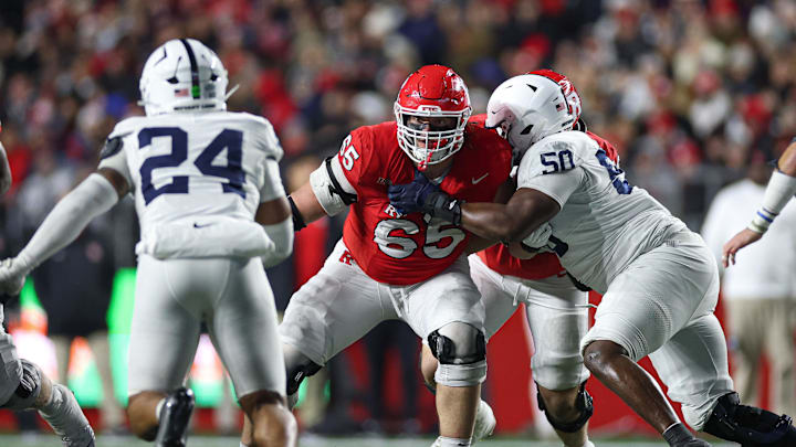 Nov 29, 2025; Piscataway, New Jersey, USA; Rutgers Scarlet Knights offensive lineman Bryan Felter (65) blocks during the second half against the Penn State Nittany Lions at SHI Stadium. Mandatory Credit: Vincent Carchietta-Imagn Images Nov 29, 2025; Piscataway, New Jersey, USA; Rutgers Scarlet Knights offensive lineman Bryan Felter (65) blocks during the second half against the Penn State Nittany Lions at SHI Stadium. Mandatory Credit: Vincent Carchietta-Imagn Images