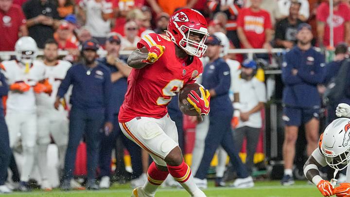 Kansas City Chiefs running back Kenneth Walker III (9) runs the ball against the Denver Broncos during the game at GEHA Field at Arrowhead Stadium. Kansas City Chiefs running back Kenneth Walker III (9) runs the ball against the Denver Broncos during the game at GEHA Field at Arrowhead Stadium.