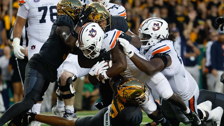 Aug 29, 2025; Waco, Texas, USA;  Auburn Tigers running back Damari Alston (0) runs the ball for a touchdown against the Baylor Bears during the first half at McLane Stadium. Mandatory Credit: Chris Jones-Imagn Images