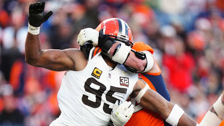 Nov 26, 2023; Denver, Colorado, USA; Denver Broncos offensive tackle Garett Bolles (72) holds