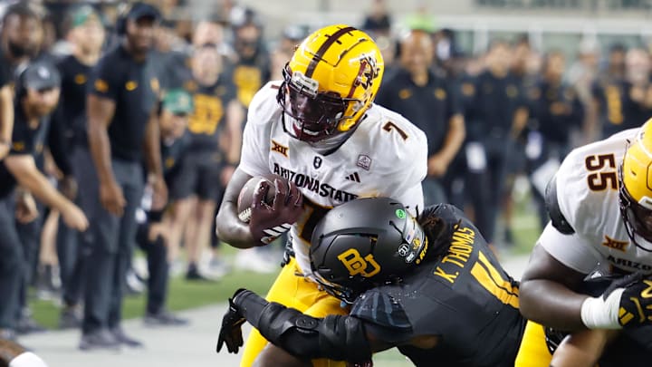 Sep 20, 2025; Waco, Texas, USA; Arizona State Sun Devils tight end Chamon Metayer (7) is tackled by Baylor Bears linebacker Keaton Thomas (11) during the second half at McLane Stadium. Mandatory Credit: Chris Jones-Imagn Images