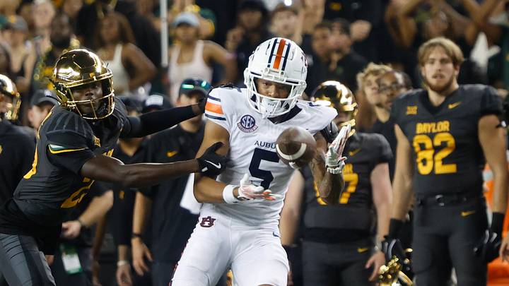 Aug 29, 2025; Waco, Texas, USA; Auburn Tigers wide receiver Horatio Fields (5) catchesa pass against Baylor Bears safety Cameren Jenkins (23) during the second half at McLane Stadium. Mandatory Credit: Chris Jones-Imagn Images Aug 29, 2025; Waco, Texas, USA; Auburn Tigers wide receiver Horatio Fields (5) catchesa pass against Baylor Bears safety Cameren Jenkins (23) during the second half at McLane Stadium. Mandatory Credit: Chris Jones-Imagn Images