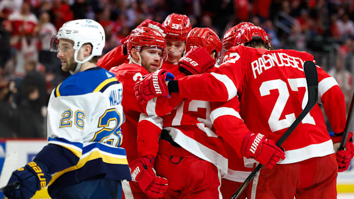 Feb 24, 2024; Detroit, Michigan, USA;  Detroit Red Wings left wing J.T. Compher (37) receives
