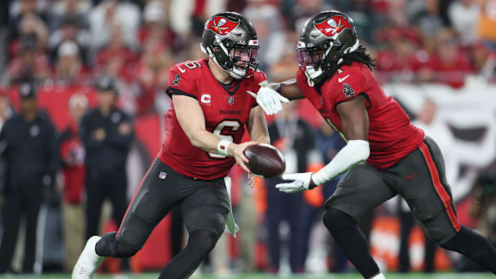 Jan 15, 2024; Tampa, Florida, USA; Tampa Bay Buccaneers quarterback Baker Mayfield (6) hands off the