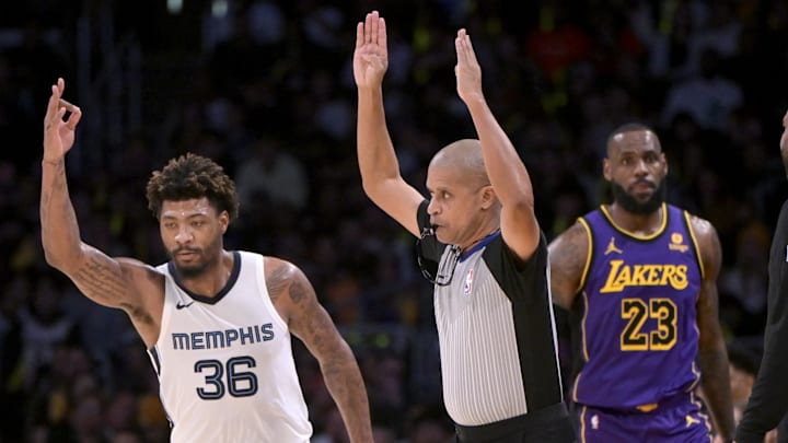 Jan 5, 2024; Los Angeles, California, USA; Memphis Grizzlies guard Marcus Smart (36) heads down court after a 3-point basket in the first half against the Los Angeles Lakers at Crypto.com Arena. Mandatory Credit: Jayne Kamin-Oncea-Imagn Images