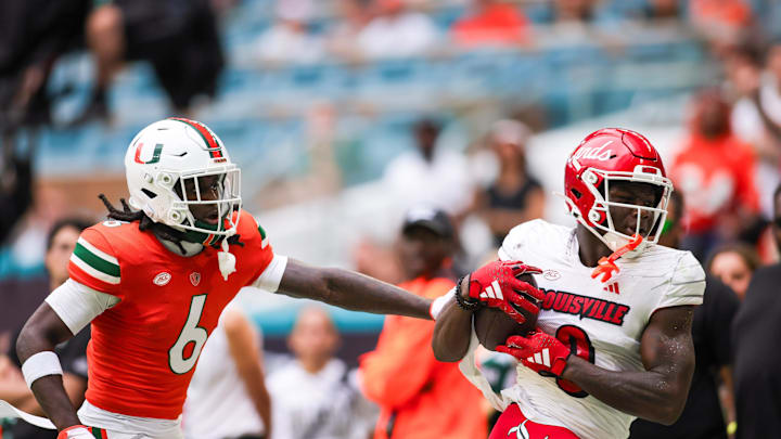 Nov 18, 2023; Miami Gardens, Florida, USA; Louisville Cardinals wide receiver Chris Bell (0) catches