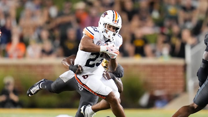 Aug 29, 2025; Waco, Texas, USA;  Auburn Tigers runningback Jeremiah Cobb (23) runs the ball against the Baylor Bears during the first half at McLane Stadium. Mandatory Credit: Chris Jones-Imagn Images