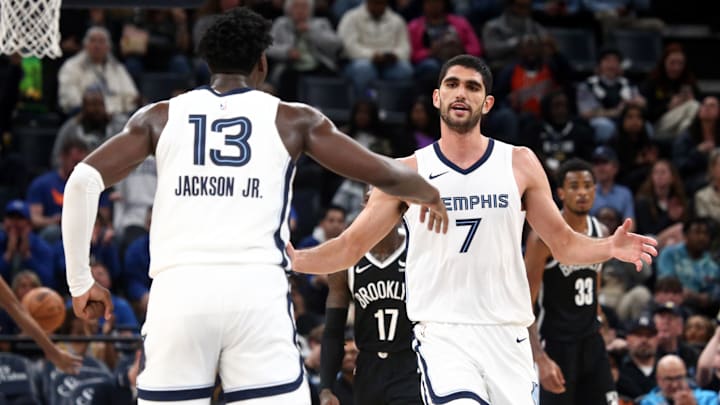 Feb 26, 2024; Memphis, Tennessee, USA; Memphis Grizzlies forward-center Santi Aldama (7) reacts with forward-center Jaren Jackson Jr. (13) during the second half against the Brooklyn Nets at FedExForum. Mandatory Credit: Petre Thomas-Imagn Images