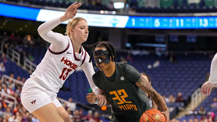 Mar 8, 2024; Greensboro, NC, USA; Miami Hurricanes forward Lazaria Spearman (32) drives around