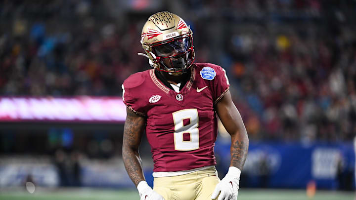 Dec 2, 2023; Charlotte, NC, USA; Florida State Seminoles defensive back Renardo Green (8) reacts
