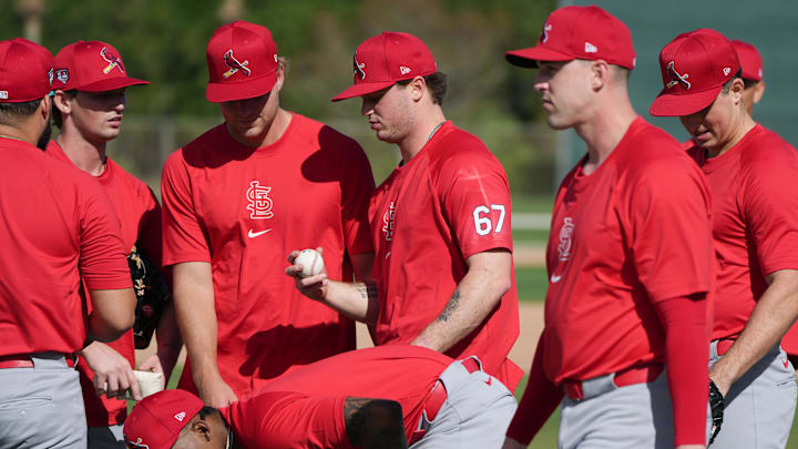 oFeb 15, 2024; Jupiter, FL, USA;  St. Louis Cardinals pitcher Gordon Graceffo (67) prepares warm-up during workouts at spring training. Mandatory Credit: Jim Rassol-Imagn Images