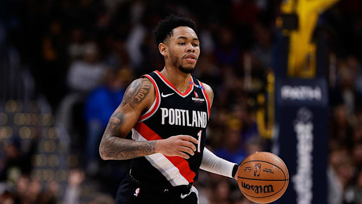 Feb 10, 2025; Denver, Colorado, USA; Portland Trail Blazers guard Anfernee Simons (1) dribbles the ball up court in the second quarter against the Denver Nuggets at Ball Arena. Mandatory Credit: Isaiah J. Downing-Imagn Images
