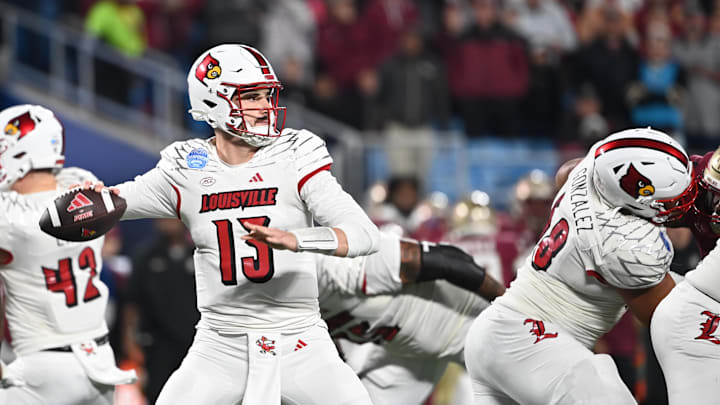 Dec 2, 2023; Charlotte, NC, USA; Louisville Cardinals quarterback Jack Plummer (13) throws against