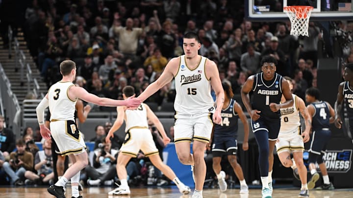 Mar 24, 2024; Indianapolis, IN, USA; Purdue Boilermakers center Zach Edey (15) celebrates with guard