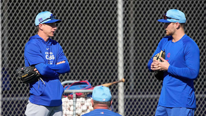 Feb 15, 2024; Mesa, AZ, USA; Chicago Cubs manager Craig Counsell talks to players during Spring