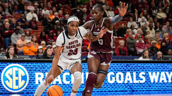 Mar 8, 2024; Greensville, SC, USA; South Carolina Gamecocks guard Bree Hall (23) drives to the basket against Texas A&M Aggies guard Aicha Coulibaly (5) during the first half at Bon Secours Wellness Arena. Mandatory Credit: Jim Dedmon-Imagn Images