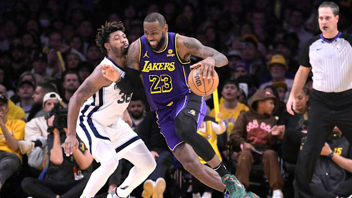 Jan 5, 2024; Los Angeles, California, USA; Memphis Grizzlies guard Marcus Smart (36) defends Los Angeles Lakers forward LeBron James (23) in the second half at Crypto.com Arena. 