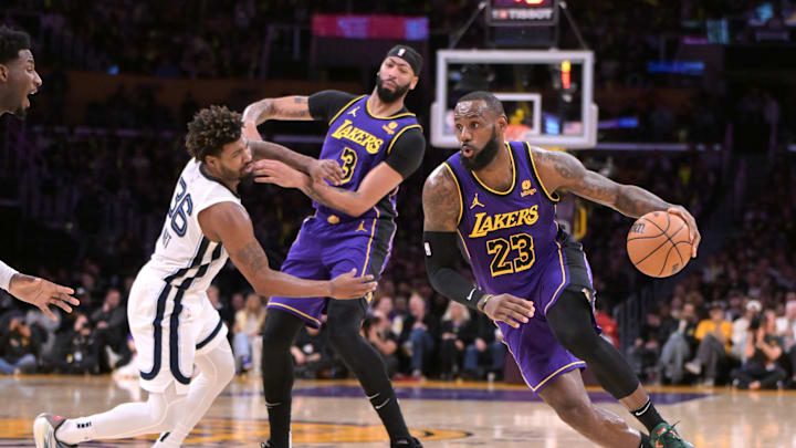 Jan 5, 2024; Los Angeles, California, USA; Los Angeles Lakers forward Anthony Davis (3) screens Memphis Grizzlies guard Marcus Smart (36) as forward LeBron James (23) drives down court in the first half at Crypto.com Arena. Mandatory Credit: Jayne Kamin-Oncea-Imagn Images Jan 5, 2024; Los Angeles, California, USA; Los Angeles Lakers forward Anthony Davis (3) screens Memphis Grizzlies guard Marcus Smart (36) as forward LeBron James (23) drives down court in the first half at Crypto.com Arena. Mandatory Credit: Jayne Kamin-Oncea-Imagn Images