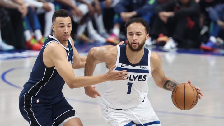 May 28, 2024; Dallas, Texas, USA; Minnesota Timberwolves forward Kyle Anderson (1) dribbles against Dallas Mavericks guard Dante Exum (0) during the second quarter of game four of the western conference finals for the 2024 NBA playoffs at American Airlines Center. Mandatory Credit: Kevin Jairaj-USA TODAY Sports