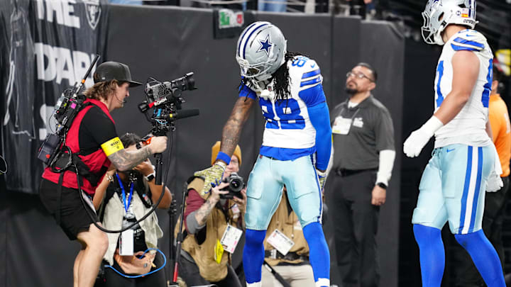Dallas Cowboys wide receiver CeeDee Lamb reacts after catching a touchdown against the Las Vegas Raiders Dallas Cowboys wide receiver CeeDee Lamb reacts after catching a touchdown against the Las Vegas Raiders