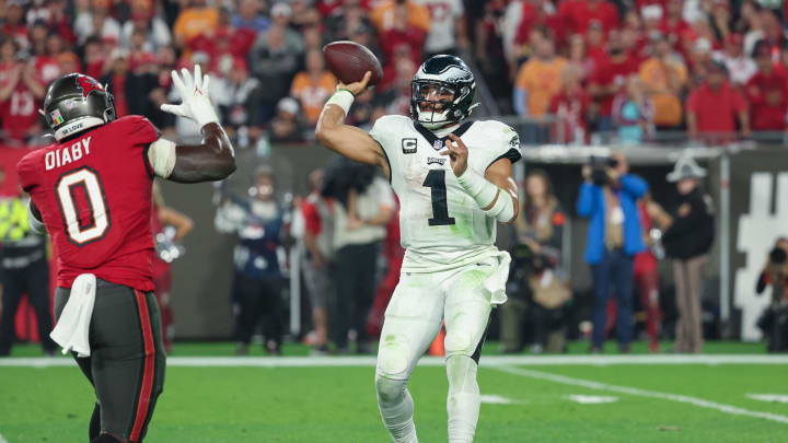 Eagles quarterback Jalen Hurts (1) throws against the Tampa Bay Buccaneers during the second half of a 2024 NFC wild card game at Raymond James Stadium. 