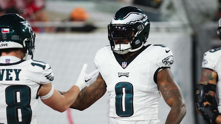 Jan 15, 2024; Tampa, Florida, USA; Philadelphia Eagles running back D'Andre Swift (0) greets wide receiver Britain Covey (18) during warm ups before a 2024 NFC wild card game at Raymond James Stadium. Mandatory Credit: Kim Klement Neitzel-Imagn Images Jan 15, 2024; Tampa, Florida, USA; Philadelphia Eagles running back D'Andre Swift (0) greets wide receiver Britain Covey (18) during warm ups before a 2024 NFC wild card game at Raymond James Stadium. Mandatory Credit: Kim Klement Neitzel-Imagn Images