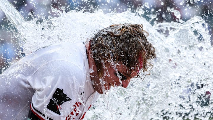 Minnesota Twins left fielder Harrison Bader (12) is doused with water after hitting a solo walk-off home run against the Tampa Bay Rays during the ninth inning at Target Field. 