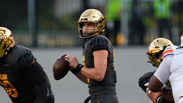 Aug 29, 2025; Waco, Texas, USA;  Baylor Bears quarterback Sawyer Robertson (13) looks to pass against the Auburn Tigers during the first half at McLane Stadium. Mandatory Credit: Chris Jones-Imagn Images
