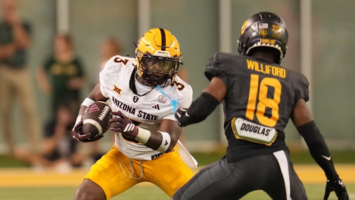 Arizona State Sun Devils running back Raleek Brown (3) carries the ball against Baylor Bears cornerback Caldra Williford (18) during the second half at McLane Stadium