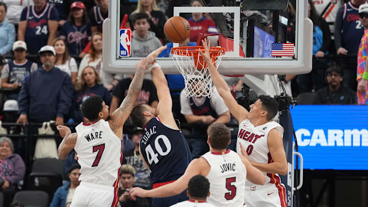 Nov 3, 2025; Inglewood, California, USA; LA Clippers center Ivica Zubac (40) shoots the ball against Miami Heat center Kel'el Ware (7), guard Dru Smith (12), forward Nikola Jovic (5) and forward Simone Fontecchio (0) in the second half at Intuit Dome. Mandatory Credit: Kirby Lee-Imagn Images Nov 3, 2025; Inglewood, California, USA; LA Clippers center Ivica Zubac (40) shoots the ball against Miami Heat center Kel'el Ware (7), guard Dru Smith (12), forward Nikola Jovic (5) and forward Simone Fontecchio (0) in the second half at Intuit Dome. Mandatory Credit: Kirby Lee-Imagn Images