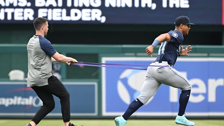 May 26, 2024; Washington, District of Columbia, USA; Seattle Mariners center fielder Julio Rodriguez (44) warms up before a game against the Washington Nationals at Nationals Park. Mandatory Credit: Rafael Suanes-USA TODAY Sports